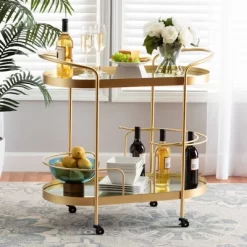 Kamal Glam Brushed Metal And Mirrored Glass 2 Tier Mobile Wine Bar Cart Gold - Baxton Studio -Online Furniture Store GUEST d97d153f 9a72 407e 8820 5274887d8b57